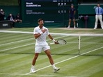 Serbia's Novak Djokovic celebrates winning his semi-final match against Canada's Denis Shapovalov.