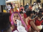 Mumbai: A health worker takes swab sample of a passenger for COVID-19 test, at a railway station in Mumbai, Friday, July 9, 2021.(PTI) Mumbai: A health worker takes swab sample of a passenger for COVID-19 test, at a railway station in Mumbai, Friday, July 9, 2021.(PTI)