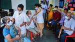 Health workers administer Covid-19 vaccine dose to senior citizens in Thane on Wednesday, July 7. (PTI) Health workers administer Covid-19 vaccine dose to senior citizens in Thane on Wednesday, July 7. (PTI)