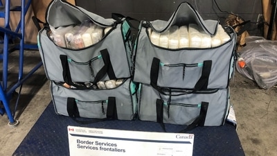 Border agents discovered the cocaine, estimated at $14 million, inside five duffle bags. (CBSA) Border agents discovered the cocaine, estimated at $14 million, inside five duffle bags. (CBSA)