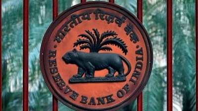 A Reserve Bank of India (RBI) logo is seen at the gate of its office in New Delhi. (Reuters)