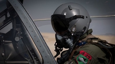 An Afghan A-29 pilot prepared for flight in the cockpit of his aircraft, at Kandahar Airfield, Afghanistan. (via Reuters / File)