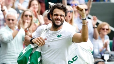 Itay's Matteo Berrettini celebrates winning his semi-final match against Poland's Hubert Hurkacz. (REUTERS)