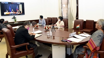 Union Minister for Finance and Corporate Affairs Nirmala Sitharaman virtually participates in the G20 High-Level Tax Symposium on Tax Policy and Climate Change, in New Delhi on Saturday. (ANI Photo) Union Minister for Finance and Corporate Affairs Nirmala Sitharaman virtually participates in the G20 High-Level Tax Symposium on Tax Policy and Climate Change, in New Delhi on Saturday. (ANI Photo)
