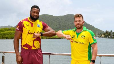 Kieron Pollard (L) of West Indies and Aaron Finch (R) of Australia pose for a photo a day ahead of the 1st T20 between the two teams at the Darren Sammy Cricket Ground, Gros Islet, Saint Lucia. (AFP) Kieron Pollard (L) of West Indies and Aaron Finch (R) of Australia pose for a photo a day ahead of the 1st T20 between the two teams at the Darren Sammy Cricket Ground, Gros Islet, Saint Lucia. (AFP)