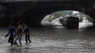 A bus is submerged under Minto bridge during heavy monsoon rain in New Delhi in 2018. (File photo) A bus is submerged under Minto bridge during heavy monsoon rain in New Delhi in 2018. (File photo)