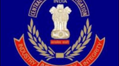 Central Bureau of Investigation officials carried out searches in three districts