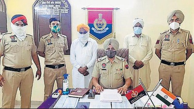 Two men wanted for the murder of a woman, who was killed in 2016, for marrying against her parents’ wishes in police custody Ludhiana on Friday (HT photo)