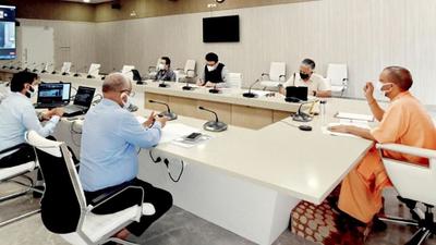Uttar Pradesh chief minister Yogi Adityanath at a Covid-19 review meeting in Lucknow. (PTI FILE PHOTO)