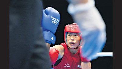 Mary Kom at the London Olympics in 2012. Training ahead of these Games, she barely spoke. “What will I talk about? I am just full of thoughts of how I’m going to beat up the person in front of me,” she said. (AFP via Getty Images) Mary Kom at the London Olympics in 2012. Training ahead of these Games, she barely spoke. “What will I talk about? I am just full of thoughts of how I’m going to beat up the person in front of me,” she said. (AFP via Getty Images)