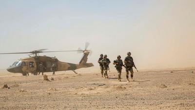 Afghan National Army 215th Corps troops disembark an Afghan Air Force (AAF) Black Hawk helicopter during a troop re-supply at Camp Shorabak in Helmand Province in 2018. (Representational image/REUTERS) Afghan National Army 215th Corps troops disembark an Afghan Air Force (AAF) Black Hawk helicopter during a troop re-supply at Camp Shorabak in Helmand Province in 2018. (Representational image/REUTERS)