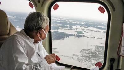 Bihar chief minister Nitish Kumar conducts aerial survey of the flood affected area in North Bihar, in Patna on July 6. (PTI) Bihar chief minister Nitish Kumar conducts aerial survey of the flood affected area in North Bihar, in Patna on July 6. (PTI)