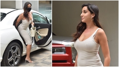 Nora Fatehi spotted by the paparazzi in a bodycon dress. Nora Fatehi spotted by the paparazzi in a bodycon dress.