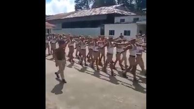 The screengrab from the video shared by Anand Mahindra shows the contingent marching to a Bollywood song. (Twitter/@anandmahindra)