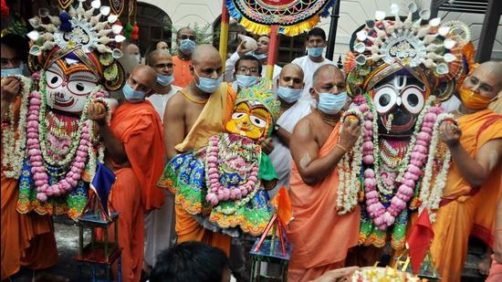 Kolkata: Devotees pray at the ISKCON temple on the occasion of the Rath Yatra festival, in Kolkata, Tuesday, June 23, 2020. The grand Rath Yatra festival procession is not organised this year due to the COVID 19 pandemic. (PTI Photo)(PTI23-06-2020_000032A) (PTI)