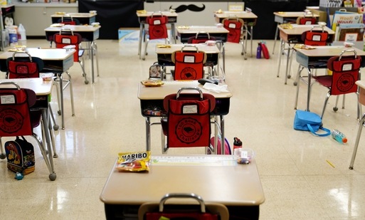 In the fall of 2021, vaccinated teachers and students should no longer wear masks inside school buildings and no one need bother with them outside, the Centers for Disease Control and Prevention said Friday. (AP Photo)