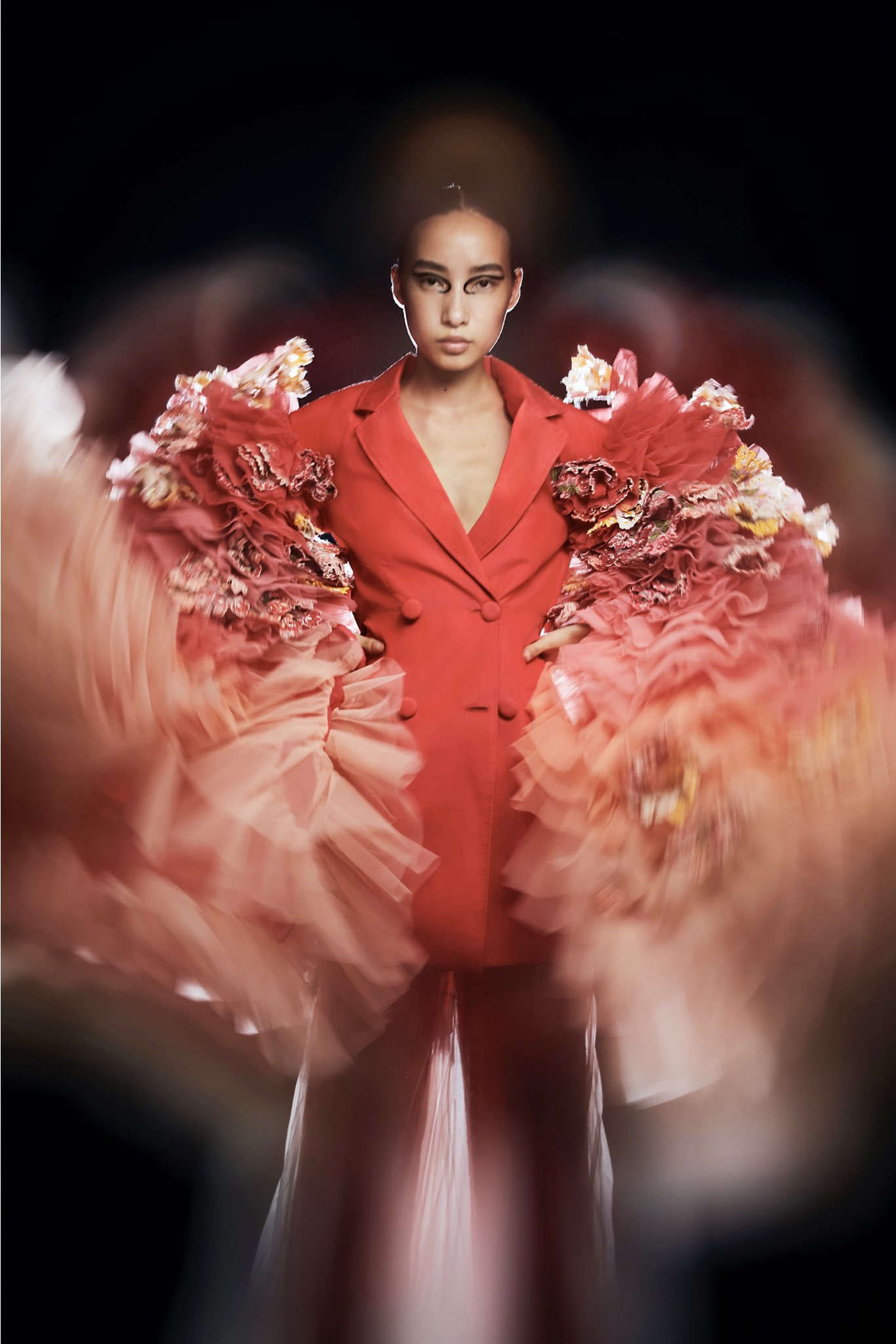 Extravagant sleeves adding gravitas to the pantsuit Extravagant sleeves adding gravitas to the pantsuit