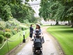 A visitor walks past the herbaceous border at the The Garden of Buckingham Palace, during a preview day before it opens to the public, in London, Britain, July 8, 2021. The Rose Garden at Buckingham Palace is made up of formal beds, in the Victorian style. This part of the garden however dates from the 1960s.(REUTERS)