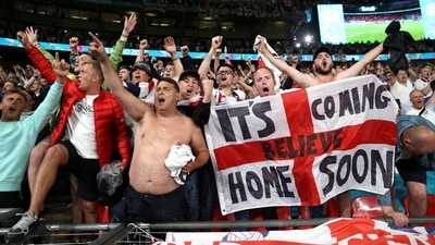 Soccer Football - Euro 2020 - Semi Final - England v Denmark - Wembley Stadium, London, Britain - July 7, 2021 England fans celebrate after the match Pool via REUTERS/Carl Recine (Pool via REUTERS)