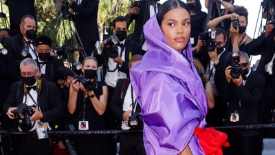The 74th Cannes Film Festival - Screening of the film "Benedetta" in competition - Red Carpet Arrivals - Cannes, France, July 9, 2021. Model Tina Kunakey poses.  (REUTERS)