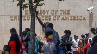 Haitians gather outside the U.S. Embassy after the assassination of President Jovenel Moise, in Port-au-Prince, Haiti July 9, 2021. (REUTERS)