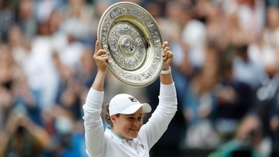 Australia's Ashleigh Barty celebrates with the trophy after winning her final match against Czech Republic's Karolina Pliskova Pool via REUTERS/Peter Nicholls (Pool via REUTERS)