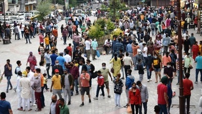 Tourists gather at Mall Road after the relaxation in COVID-19 restrictions, in Manali, Himachal Pradesh. (ANI)