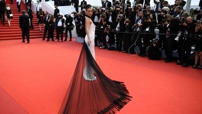 US model Bella Hadid arrives for the opening ceremony and the screening of the film "Annette" at the 74th edition of the Cannes Film Festival in Cannes, southern France, on July 6, 2021. (AFP) US model Bella Hadid arrives for the opening ceremony and the screening of the film "Annette" at the 74th edition of the Cannes Film Festival in Cannes, southern France, on July 6, 2021. (AFP)
