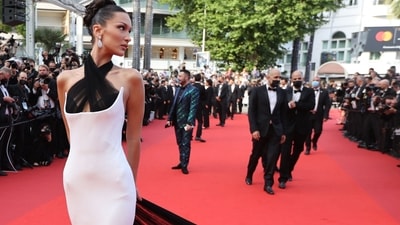 US model Bella Hadid arrives for the opening ceremony and the screening of the film "Annette" at the 74th edition of the Cannes Film Festival in Cannes, southern France, on July 6, 2021. (AFP) US model Bella Hadid arrives for the opening ceremony and the screening of the film "Annette" at the 74th edition of the Cannes Film Festival in Cannes, southern France, on July 6, 2021. (AFP)
