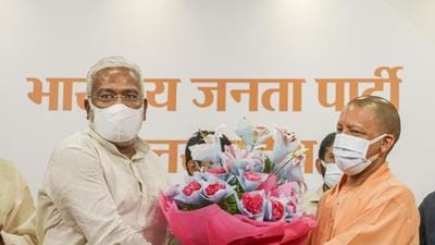 Uttar Pradesh chief minister and state BJP chief Swatantra Dev celebrate the party’s victory in the block pramukh polls (PTI Photo) Uttar Pradesh chief minister and state BJP chief Swatantra Dev celebrate the party’s victory in the block pramukh polls (PTI Photo)