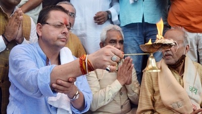 Newly designated Uttarakhand CM, Pushkar Singh Dhami performs Aarti of Ganga Pooja at Har ki Pauri, in Haridwar on Wednesday. (ANI)
