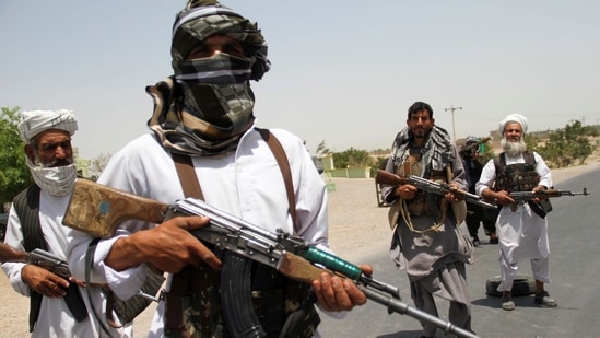 Former Mujahideen hold weapons to support Afghan forces in their fight against Taliban, on the outskirts of Herat province, Afghanistan July 10, 2021. (REUTERS)