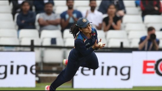 Close to the boundary line, Mohali’s Harleen tossed the ball in the air and came back inside the line to complete the catch. (HT Photo)