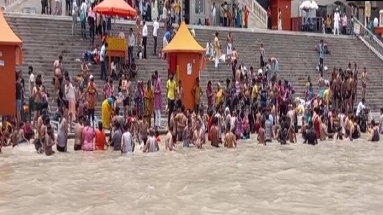 Devotees seen flocking Haridwar in Uttarakhand for Har ki Pauri after the state government recently eased restrictions in the city. (ANI Photo)