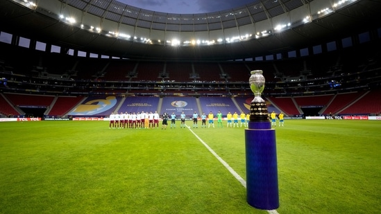 The Copa America trophy is placed on the field prior to the opening match between Brazil and Venezuela at National Stadium in Brasilia, Brazil, Sunday, June 13, 2021. (AP Photo/Ricardo Mazalan)(AP)