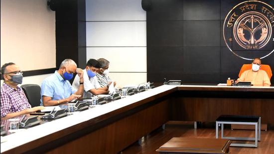 Uttar Pradesh chief minister Yogi Adityanath at a Covid-19 review meeting in Lucknow on Saturday. (HT Photo)