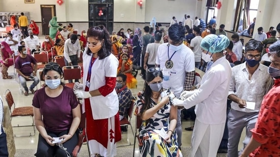 Healthcare workers administer Covid-19 vaccine to beneficiaries during a special drive, in Beawar, Rajasthan, on July 8.(PTI Photo)