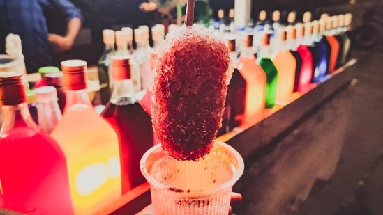 Ice gola: Ice lolly or ice gola is made with crushed ice and flavoured syrups. It is a very simple dessert enjoyed across all age groups. Summers are incomplete without this desi popsicle.(Unsplash)