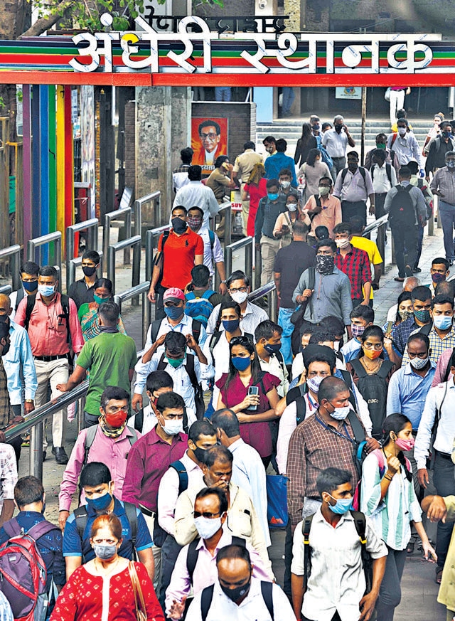 Outside Andheri railway station, the crowds seem almost normal, until you realise everyone’s wearing a mask. (Satish Bate / HT) Outside Andheri railway station, the crowds seem almost normal, until you realise everyone’s wearing a mask. (Satish Bate / HT)
