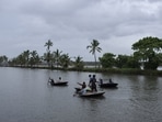 Members of a nomadic fishing community fish in backwaters during monsoon rains in Kochi, Kerala. (AP Photo) Members of a nomadic fishing community fish in backwaters during monsoon rains in Kochi, Kerala. (AP Photo)