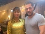 Arshi Khan poses with Salman Khan at the Bigg Boss 14 after-party. Arshi Khan poses with Salman Khan at the Bigg Boss 14 after-party.