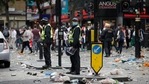 Two police officers stand amidst litter near Leicester Square in London, Sunday, July 11, 2021, prior to the Euro 2020 soccer championship final match between England and Italy which will be played at Wembley Stadium. (AP Photo/Peter Morrison)(AP) Two police officers stand amidst litter near Leicester Square in London, Sunday, July 11, 2021, prior to the Euro 2020 soccer championship final match between England and Italy which will be played at Wembley Stadium. (AP Photo/Peter Morrison)(AP)
