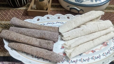Narikol Pitha: This is similar to til pitha but the stuffing here is replaced with grated coconut mixed with sugar syrup.  (Instagram/@geetamohan.journo)