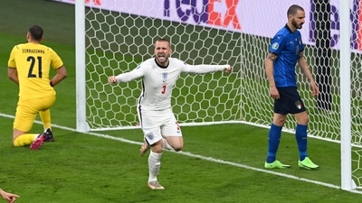 England's Luke Shaw celebrates scoring their first goal. (Pool via REUTERS)