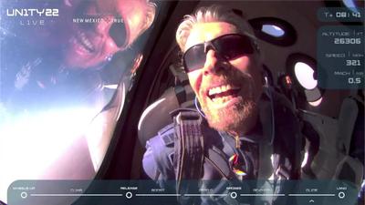 Billionaire Richard Branson reacts on board Virgin Galactic’s passenger rocket plane VSS Unity after reaching the edge of space above Spaceport America near Truth or Consequences, New Mexico, US, on Sunday. (REUTERS) Billionaire Richard Branson reacts on board Virgin Galactic’s passenger rocket plane VSS Unity after reaching the edge of space above Spaceport America near Truth or Consequences, New Mexico, US, on Sunday. (REUTERS)