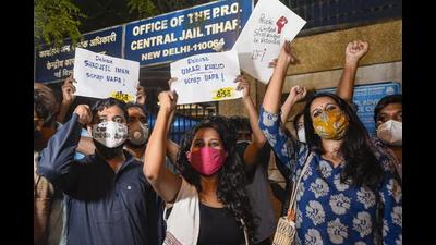 Student activists Natasha Narwal, Devangana Kalita and Asif Iqbal Tanha outside Tihar prison, after a court ordered their immediate release in the Delhi riots "conspiracy" case, New Delhi, June 17, 2021 (PTI)