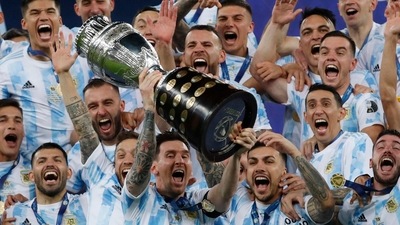 Argentina's Lionel Messi celebrates with the trophy after beating Brazil 1-0 in the Copa America final (AP) Argentina's Lionel Messi celebrates with the trophy after beating Brazil 1-0 in the Copa America final (AP)