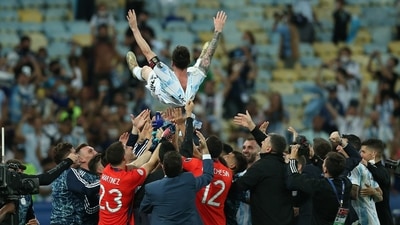 Argentina captain Lionel Messi lifted in the air by his teammates after winning the Copa America 2021 title. (Getty Images) Argentina captain Lionel Messi lifted in the air by his teammates after winning the Copa America 2021 title. (Getty Images)