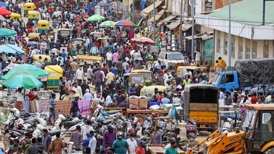 People crowded a Sunday market in Bengaluru on July 11. (PTI) People crowded a Sunday market in Bengaluru on July 11. (PTI)