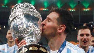 Argentina's Lionel Messi kisses the trophy after beating Brazil 1-0 in the Copa America final (AP)